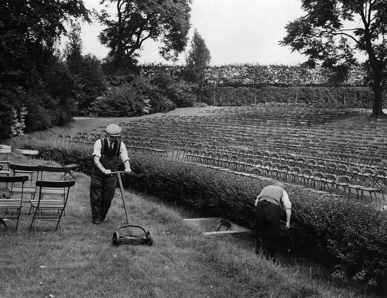 Gardeners preparing the grounds for a performance at the Open Air Theatre