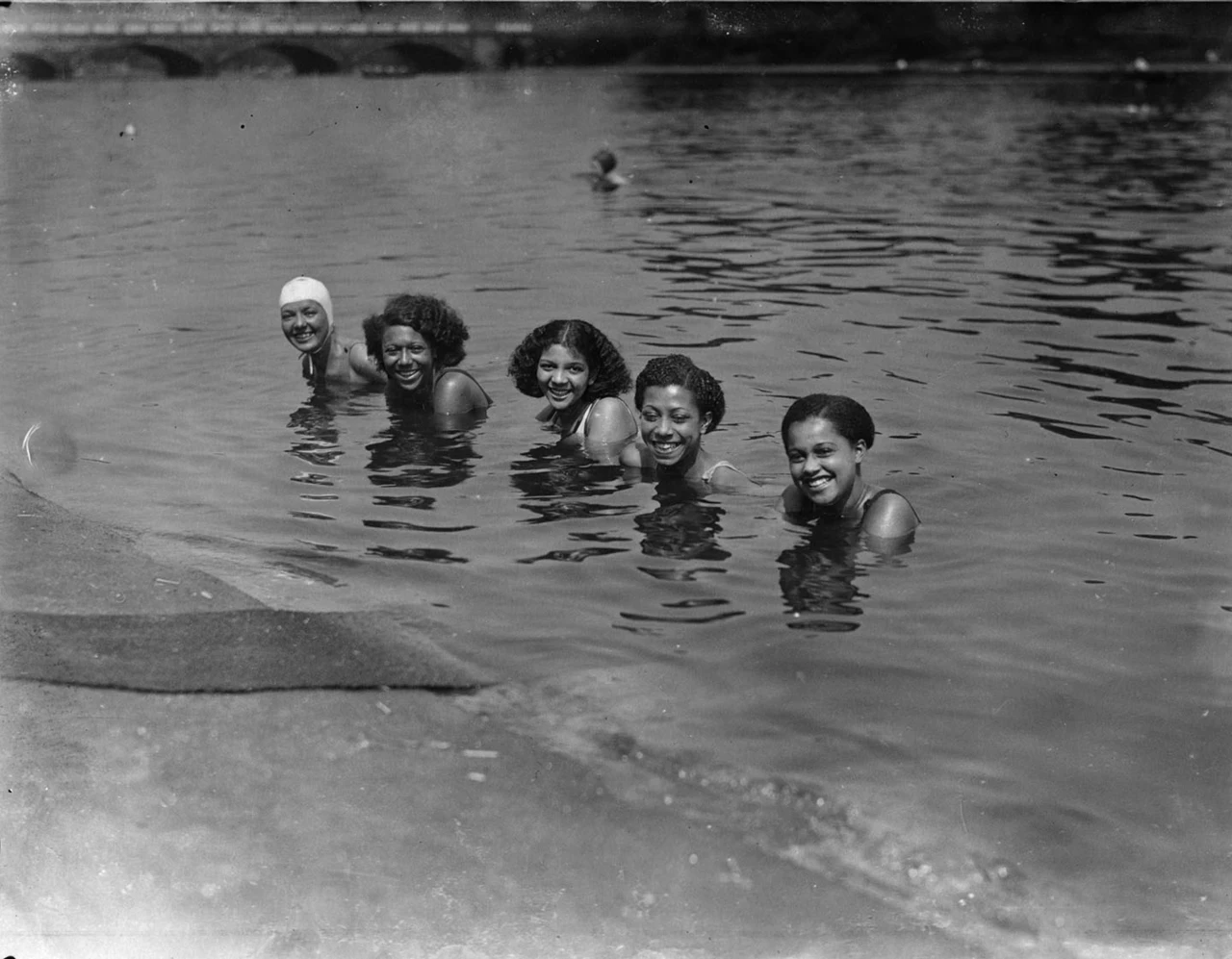 Five girls from the Grafton Theatre, London keeping cool in the Serpentine Lido