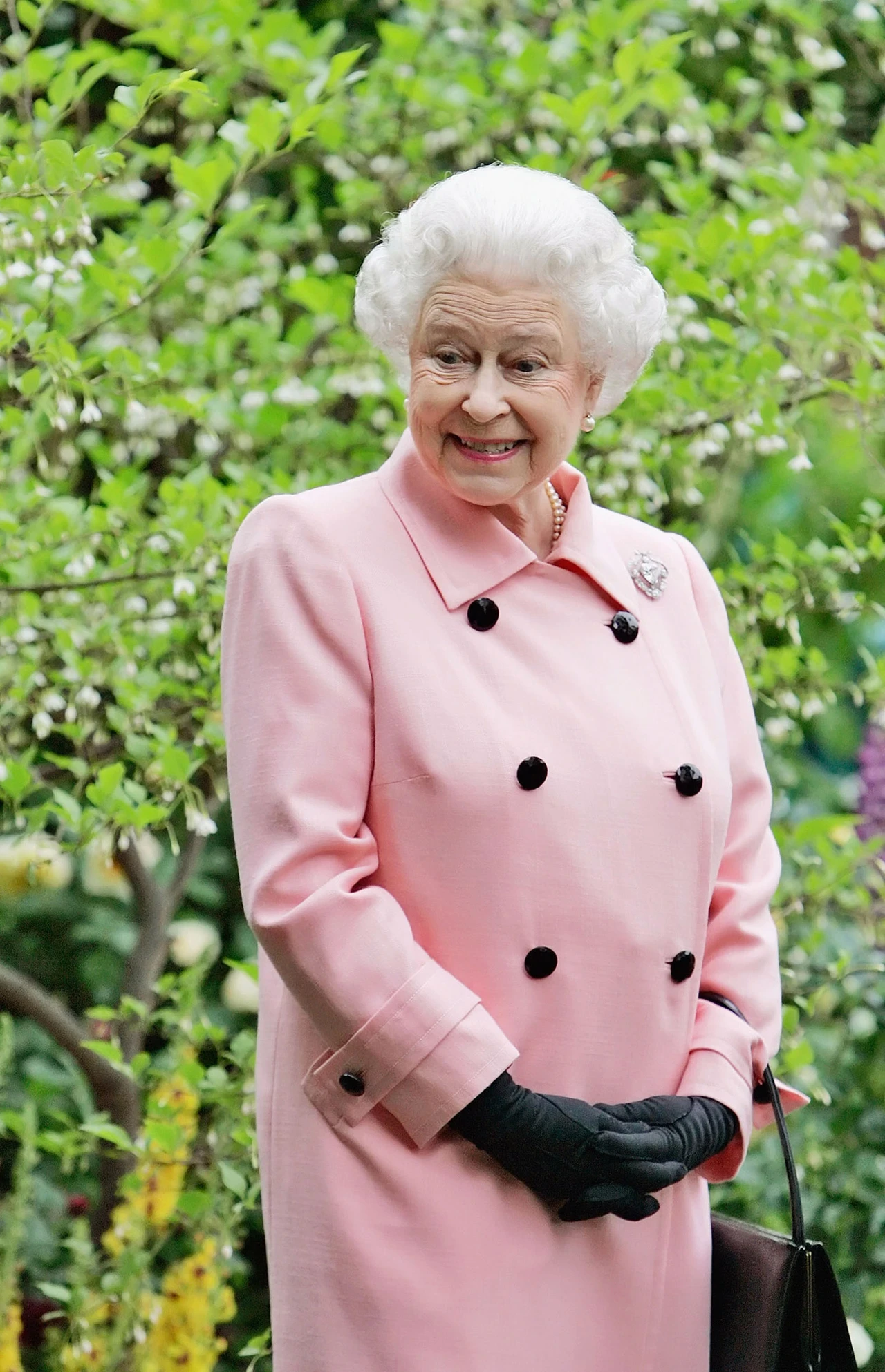 Queen Elizabeth II admires one of the gardens at RHS Chelsea Flower Show
