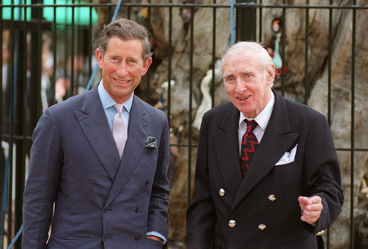 The then Prince Charles and Spike Milligan unveil the Elfin Oak in Kensington Gardens, 1997