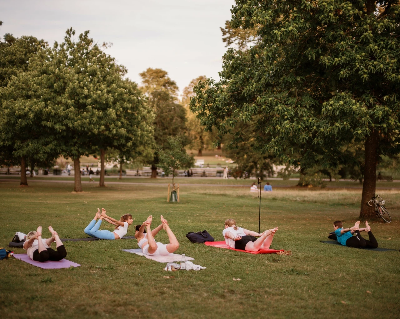 People taking part in yoga in the Royal Parks